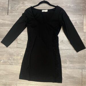 Black Bycorpus bodycon dress size Small with lace detail on sides